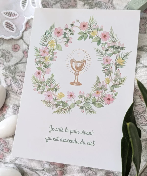 Image signet de première communion avec un calice doré et une couronne de fleurs printanières.